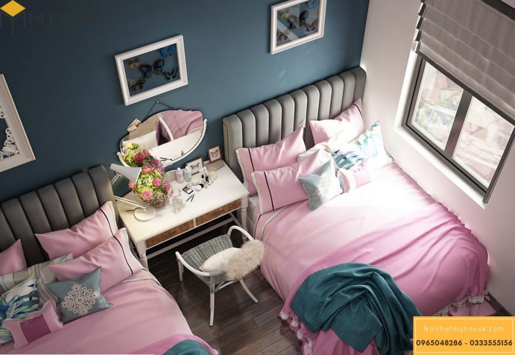 Căn phòng nội thất tiện nghi với gam màu hồng