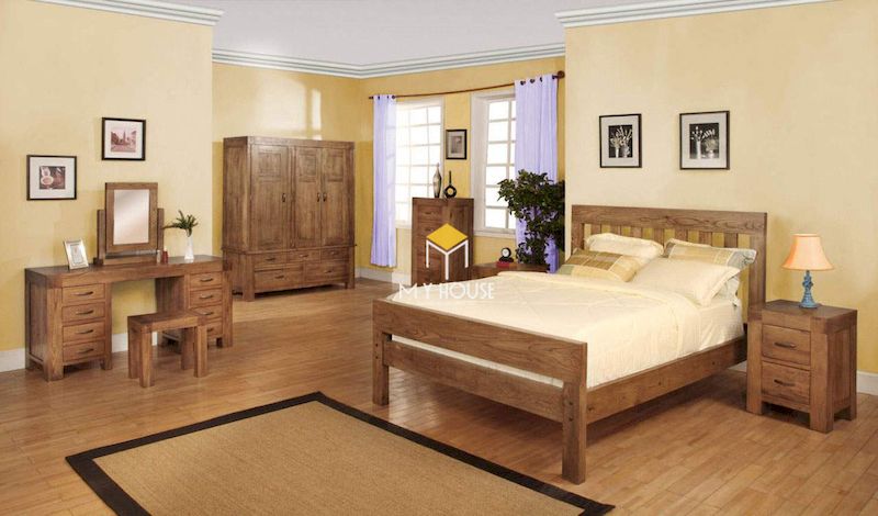 Thiết kế nội thất phòng ngủ với giường gỗ 4 chân cao