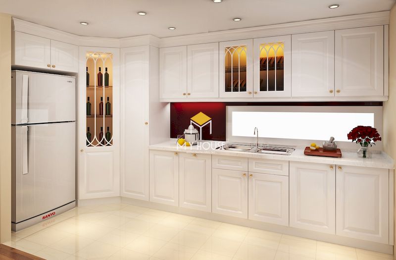 Tủ bếp tân cổ điển gỗ tự nhiên sơn màu trắng sang trọng phù hợp với tổng thể nội thất